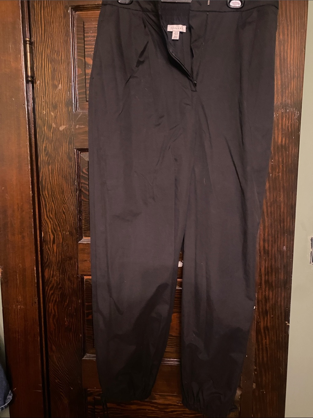 Topshop, black parachute pants with tie up at ankle